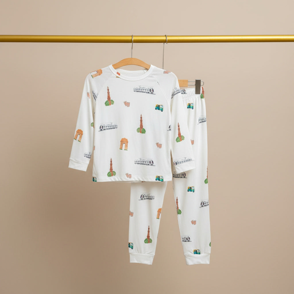 Children's pajama set with cartoon designs on a beige background