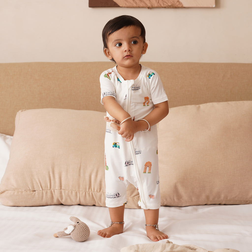 Toddler standing in bamboo onesie
