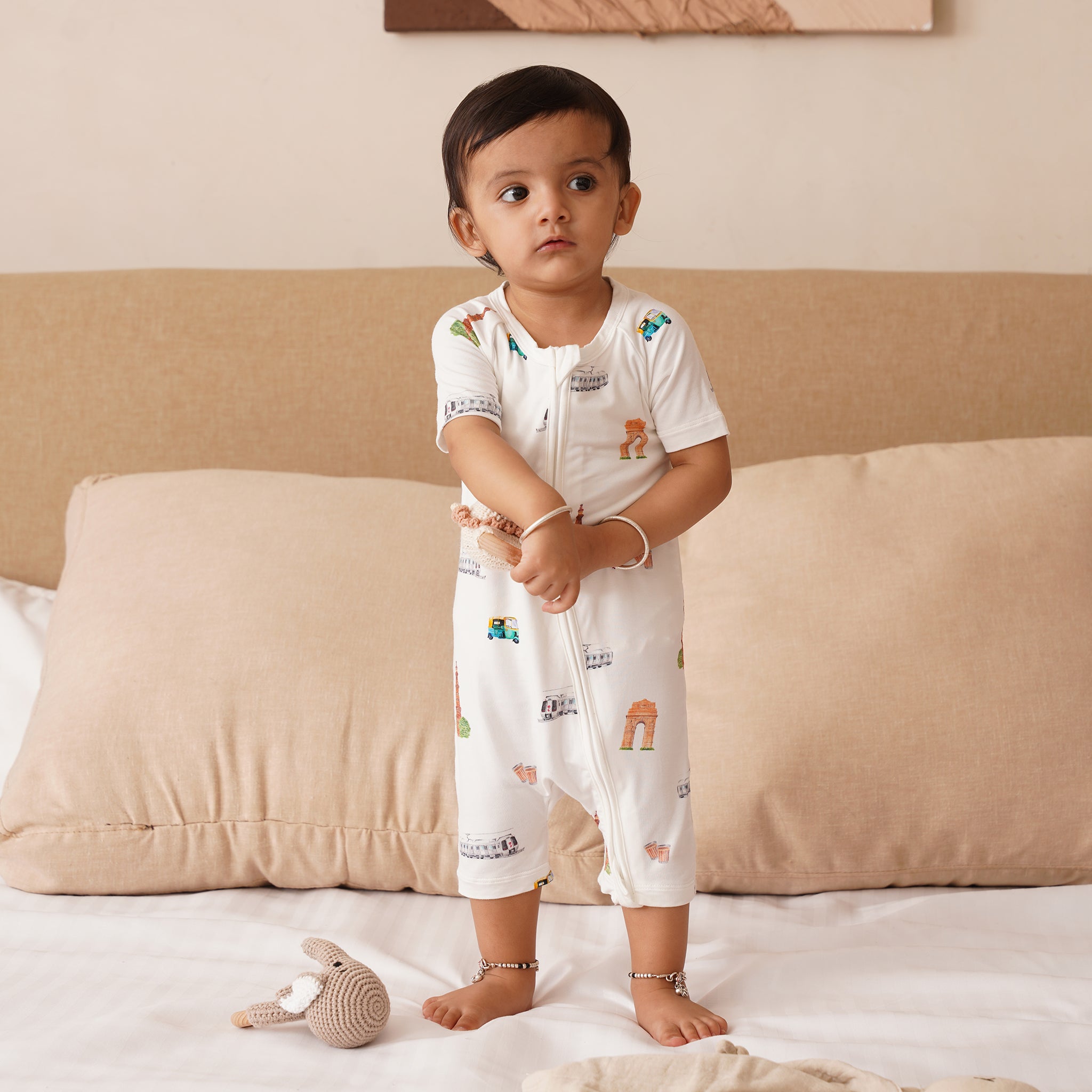 Toddler standing in bamboo onesie