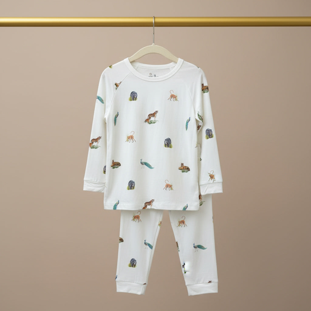 Children's pajama set with animal print on a beige background